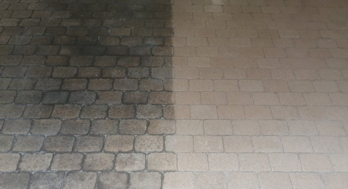 Lavage haute pression à eau chaude 150°C sur façade béton à Neuchâtel et Fribourg